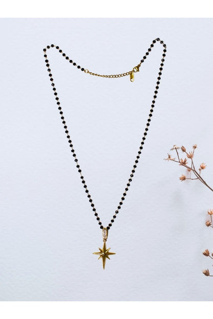 Gold North Star Pendant Necklace with Black Beads – 54 cm